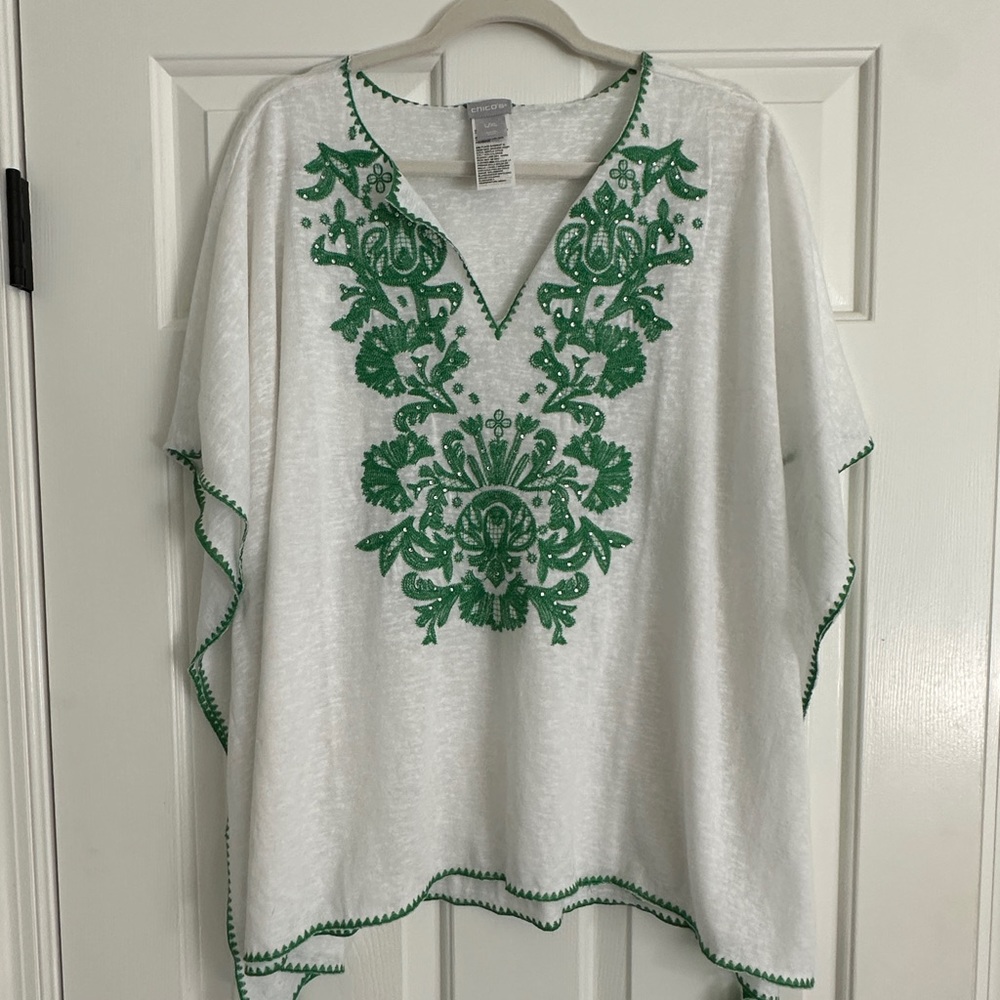 CHICOs knit poncho style top with tassels